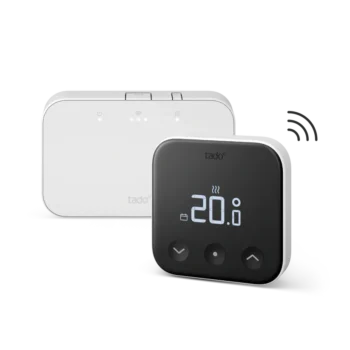 Wireless Smart Thermostat X with programmer for hot water control, showing 20 degrees Celsius on the display — Tado X thermostat with wireless bridge.