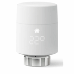 Tado V3+ Smart Radiator Thermostat with LED temperature display showing 22 degrees, in a white cylindrical design