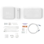 Tado V3+ starter kit box contents, including thermostat, wireless receiver, Internet Bridge, cables and mounting accessories